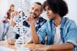 © Viacheslav Yakobchuk - Excited young scientists discovering the structure of human genome