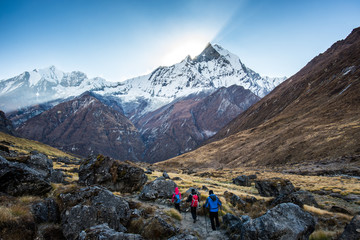 The traveler's walking on the way to Annapurna base camp