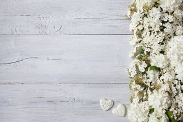 Wedding background with white flowers and heart