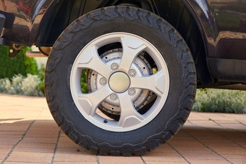 Wall Mural - Wheel of a 4x4 vehicle