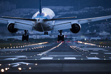 In The Evening, The Plane Is About To Land On The Runway