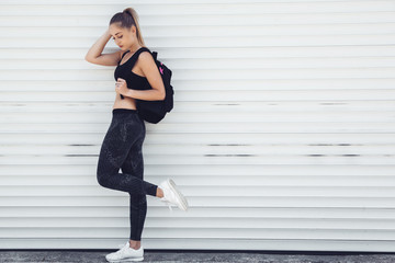 Fitness sporty girl wearing fashion clothes