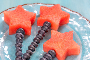 Wall Mural - Watermelon stars with blueberry stick