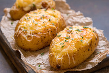 Baked Stuffed Potatoes With Cheese And Bacon