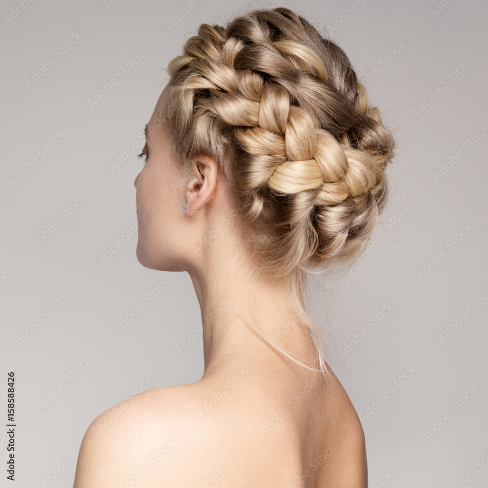 Portrait Of A Beautiful Young Blond Woman With Braid Crown Hairstyle. - obrazy, fototapety, plakaty 