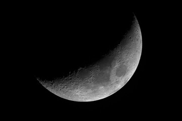 Wall Mural - moon in waxing crescent phase.