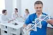 © zinkevych - Intelligent medic observing genetic code model at the hospital