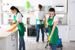 © Africa Studio - Cleaning service team working in kitchen