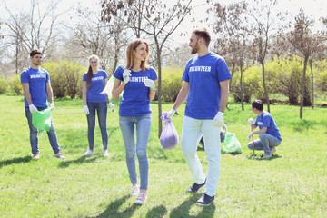 Canvas Print - Group of volunteers working in park