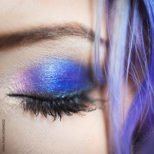 Close Up Blue Eye Of A Beautiful Sexy Young With Lilac And Pink