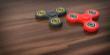 Fidget Spinners On Wooden Background. 3d Illustration