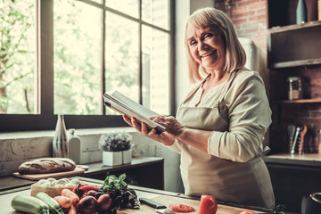 Old woman in kitchen