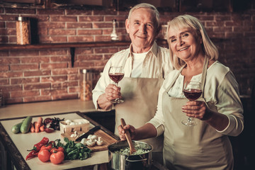 Wall Mural - Old couple in kitchen