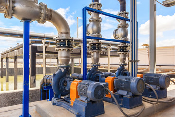 Wastewater treatment plant. A new pumping station. Valves and pipes. Urban modern treatment facilities, pipelines and pumps powerful, modern automatic system protection and control.