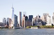 Manhattan skyline. Boat ride on Hudson river. Sunny summer day. Travel, vacation, sightseeing, New York, tourism, and urban living concept
