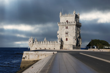 Fototapete - Belem Tower against a dramatic sky, Portugal