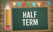 © MichaelJBerlin - Half Term on blackboard, Education school concept