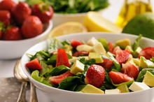 Spinach Salad With Strawberries, Avocado And Cheese.