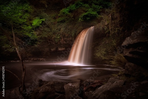 Plakat A full flow over Lady Falls or Sgwd Gwladus on the river Afon Pyrddin near Pontn