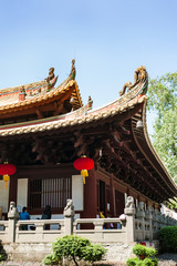 people in patio of Guangxiao Temple in Guangzhou