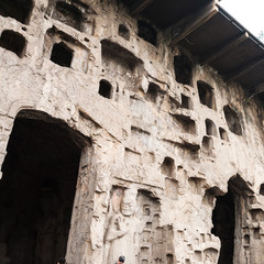 carved wall of hall in caves of West Hill