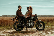 Couple And Cafe Racer Motorcycle