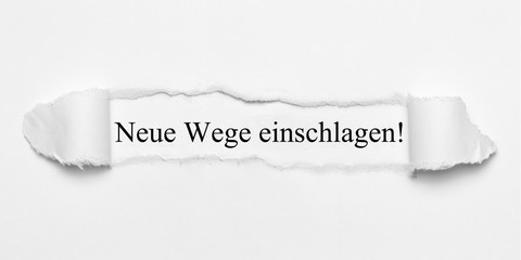 Canvas Print - Neue Wege einschlagen! auf weißen Papier