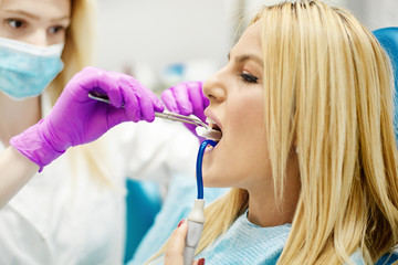 Wall Mural - Young Woman At The Dentist