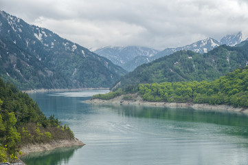 Naklejka na meble The view of Kurobe Dam. The Kurobe Dam or Kuroyon Dam is a variable-radius arch dam on the Kurobe River in Toyama Prefecture, Japan