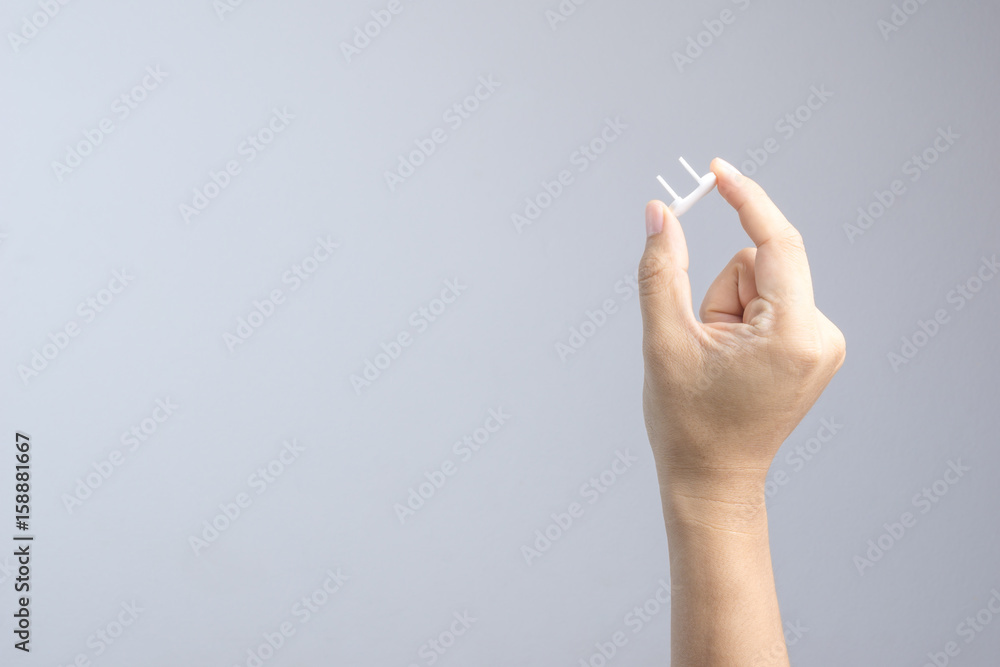 Hand holding safety plugs Stock Photo | Adobe Stock