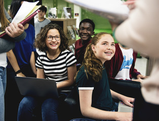 Wall Mural - group of students learning in classroom