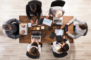 Wall Mural - Business Colleague Working At Workplace