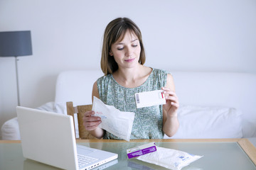 Wall Mural - woman receiving medicines bought on internet