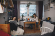 © Maskot - Young female roommates studying together in college dorm room