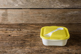 Fototapeta Nowy Jork - Empty containers for food on wooden background