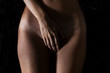 © ADDICTIVE STOCK - Crop woman covering private part