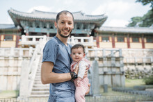 South Korea, Gyeongju, Father Traveling With A Baby Girl In Bulguksa Temple