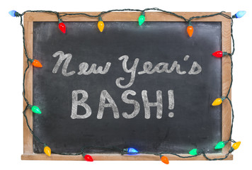 Wall Mural - New Year's bash written in white chalk on a black chalkboard surrounded with festive colorful lights 
isolated on white