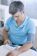 © RFBSIP - Man measuring his blood pressure
