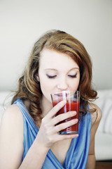 Wall Mural - Woman with cold drink