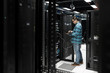 © Maa Hoo/Stocksy - Engineer working in data center