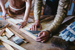 © Trinette Reed/Stocksy - Wood workers working in their art studio