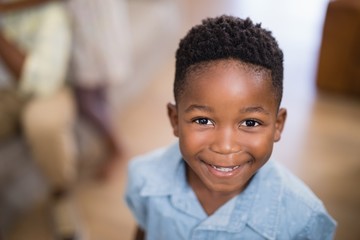 portrait of smiling boy at home