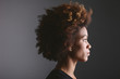 © BONNINSTUDIO/Stocksy - Side portrait of a young African American woman