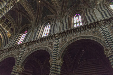 Wall Mural - Nave arcade with Renaissance busts of popes and emperors. Internal view of Duomo di Siena. Tuscany. Italy.