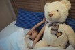 © wavebreak3 - Girl yawning while sleeping in bedroom
