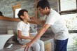 © wavebreak3 - Father brushing his sons teeth in bathroom