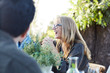 © Trinette Reed/Stocksy - Group of friends enjoying a Farm To Table Dinner Party in backyard