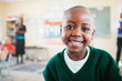 © Micky Wiswedel/Stocksy - Cute smiling African School girl