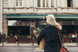 © Lumina/Stocksy - Smiling Woman Carrying a Bag With Groceries